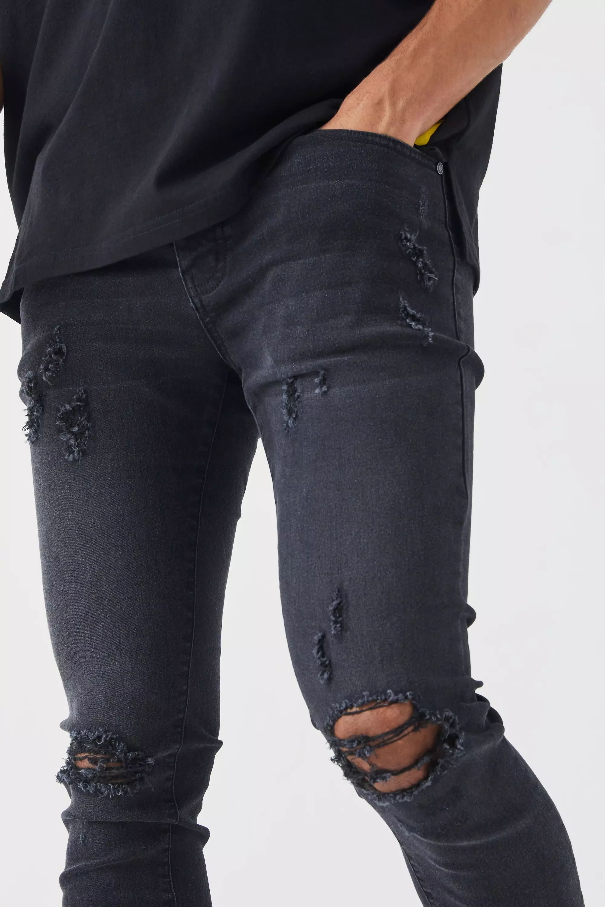 Black knee cut jeans best sale